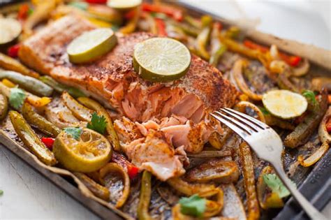 easy-sheet-pan-salmon-fajitas-the-foodie-dietitian image