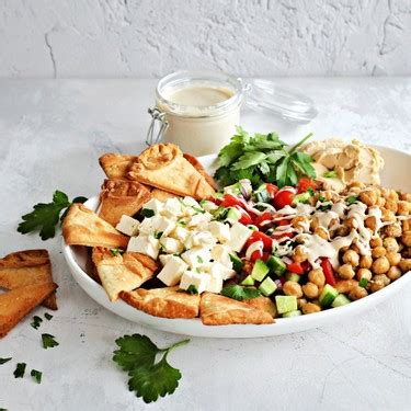 mediterranean-pita-chip-nachos-recipe-sidechef image