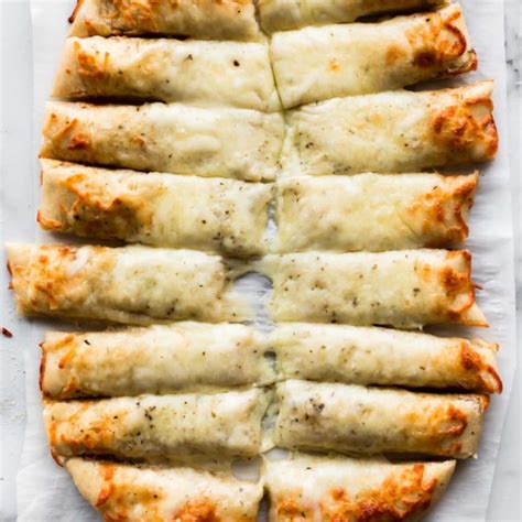 cheesy-breadsticks-made-from-pizza-dough image