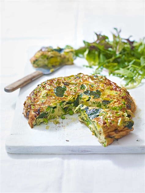 spinach-leek-and-pea-frittata-recipe-delicious-magazine image