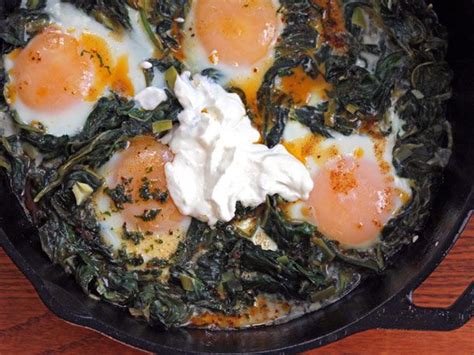 yotam-ottolenghis-skillet-baked-eggs-with-spinach image