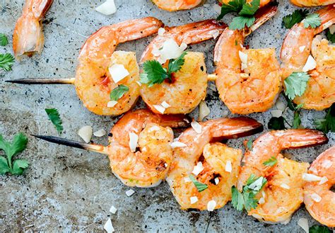 coconut-harissa-grilled-shrimp-skewers-floating image