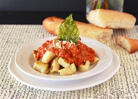 homemade-rosemary-gnocchi-with-bolagnaise-sauce image