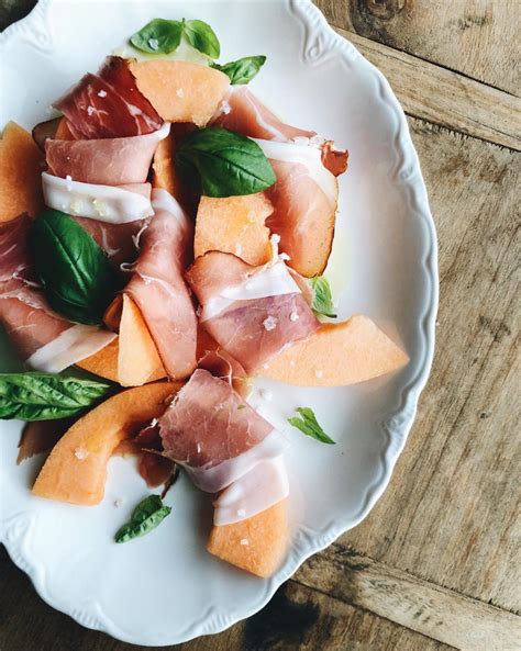 prosciutto-wrapped-cantaloupe-with-basil-the image