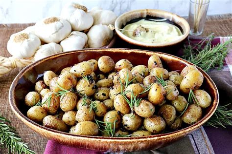 best-ever-roasted-baby-potatoes-with-garlic-and-herbs image