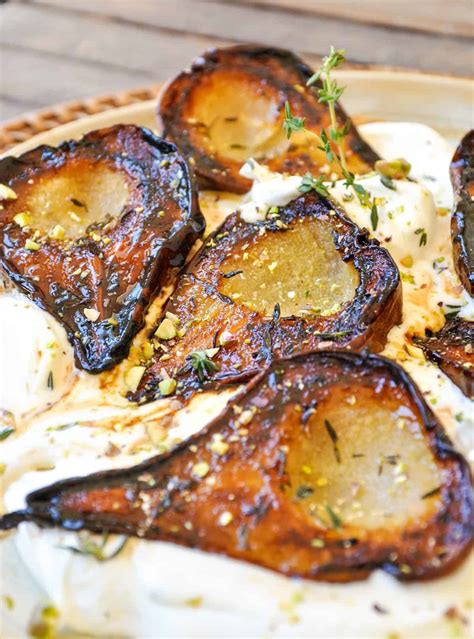 honey-thyme-roasted-pears-with-maple-cream image