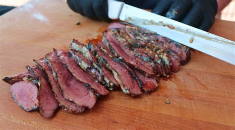 grilled-flat-iron-steak-on-grill-with-blue-cheese-butter image