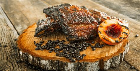 baby-back-ribs-with-espresso-grilled-peach-bbq-sauce image