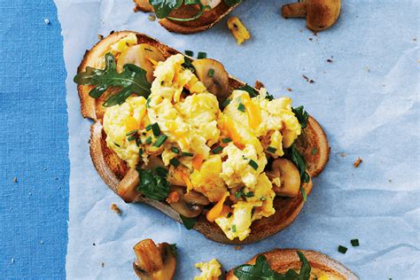chive-cheddar-scrambled-eggs-on-mushroom-toasts image