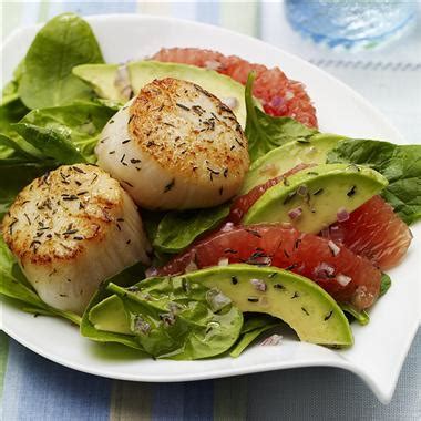 seared-scallops-with-red-grapefruit-avocado-salad image