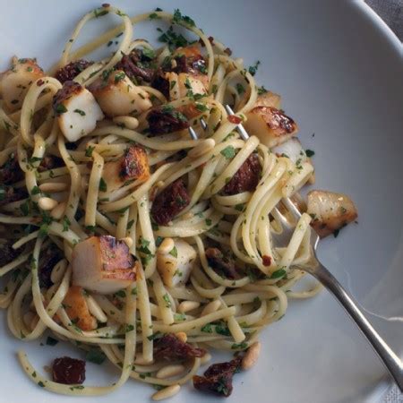 linguine-with-scallops-sun-dried-tomatoes-and-pine image