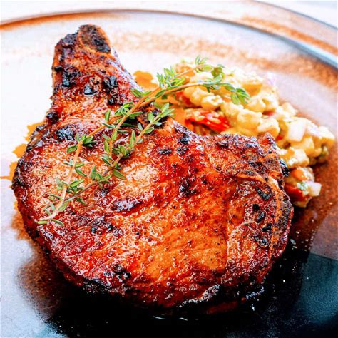 tender-pan-seared-pork-chops-how-to-brine image