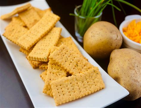cheddar-chive-potato-crackers-cracker image