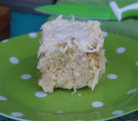 easy-coconut-poke-cake-recipe-simply-southern-mom image