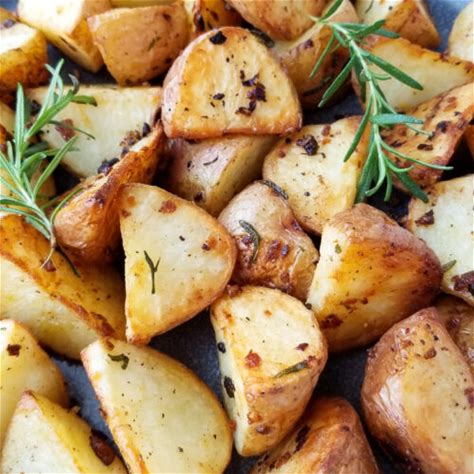 roasted-rosemary-garlic-potatoes-amanda-cooks image