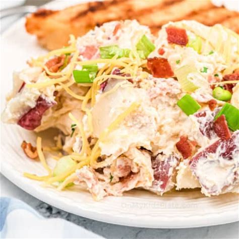 the-best-loaded-baked-potato-salad-on-my-kids-plate image