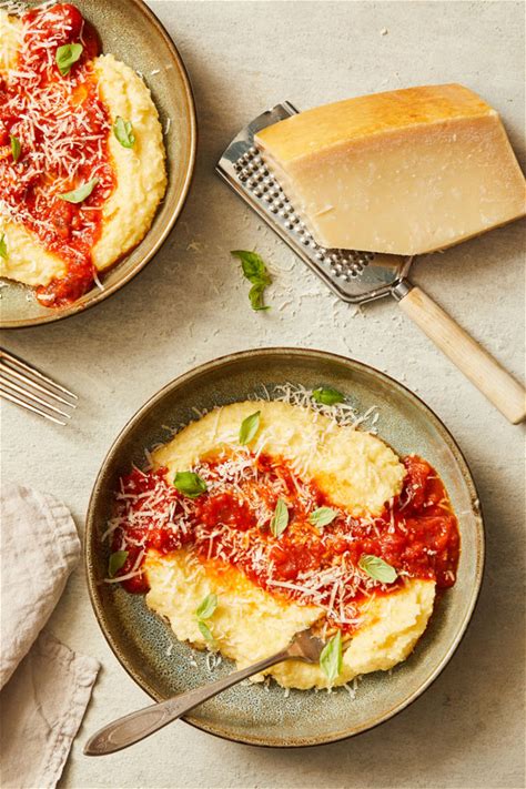 simple-polenta-with-sauce-and-cheese-delallo image