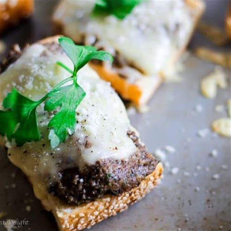 mushroom-pesto-toasts-with-fontina-cheese-eating image