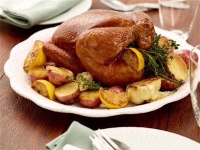 lemon-and-herb-roasted-chicken-with-baby-potatoes image