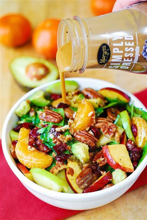apple-cranberry-spinach-salad-with-pecans-avocados image