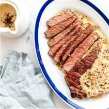 reverse-sear-ribeye-steak-with-peppercorn-sauce image
