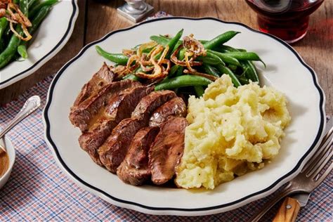 seared-steaks-thyme-pan-sauce-with-mashed image