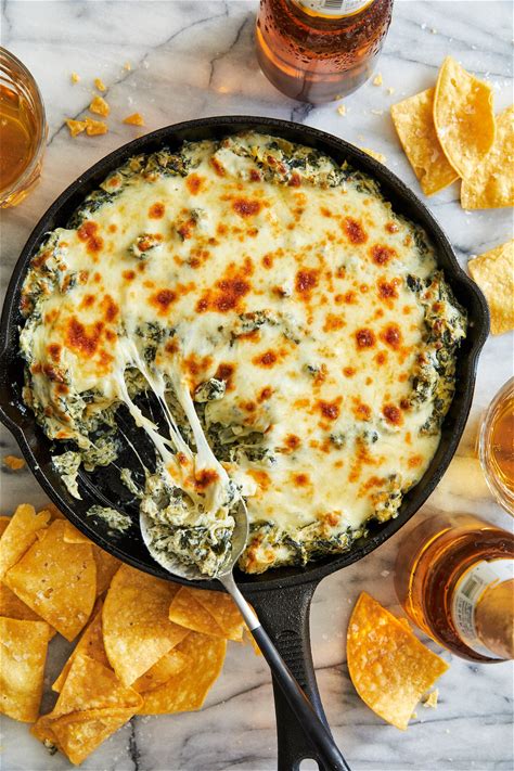 hot-spinach-and-artichoke-dip-damn-delicious image