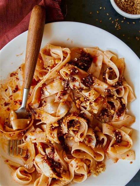 chile-oil-garlic-noodles-spoon-fork-bacon image
