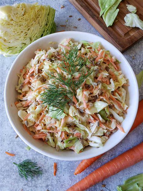tangy-coleslaw-recipe-with-sunflower-seeds-optional image