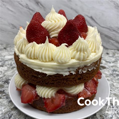 ultimate-strawberry-banana-cake-with-cream-cheese image