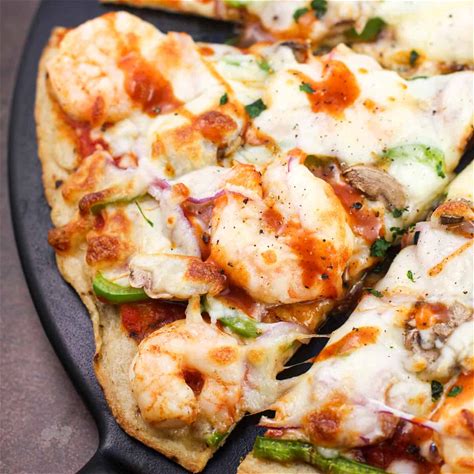 cajun-pizza-with-andouille-sausage-and-shrimp-ericas image