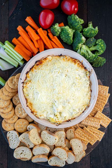 hot-and-cheesy-artichoke-dip-the-kitchen-magpie image
