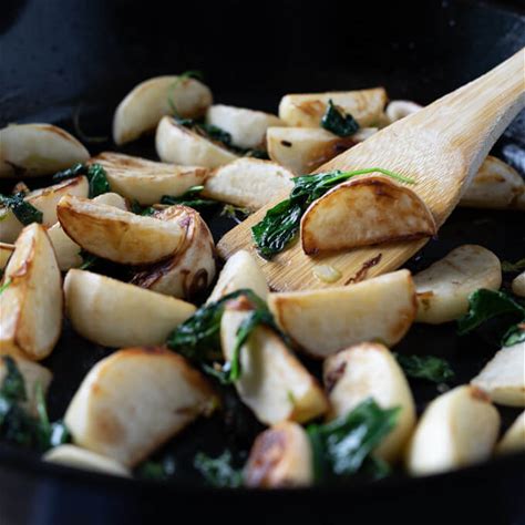 pan-fried-turnips-recipe-with-onions-and-spinach image