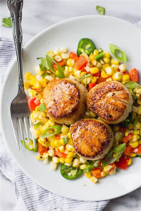 seared-scallops-on-corn-salad-fork-in-the image