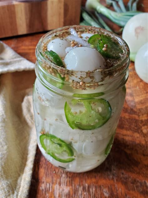 easy-pickled-quail-eggs-recipe-a-farm-girl-in-the image