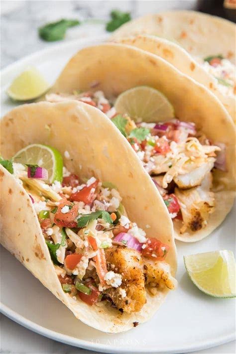 easy-fish-tacos-with-slaw-and-chipotle-sauce-40-aprons image