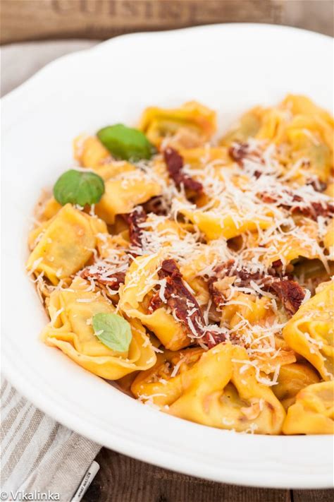tortellini-with-sun-dried-tomatoes-in-cream-sauce image