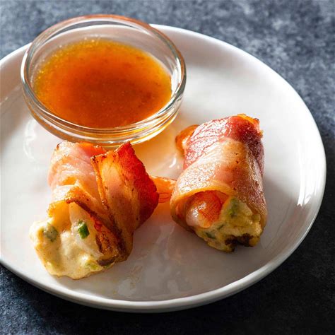 bacon-wrapped-shrimp-with-cream-cheese-stuffing image