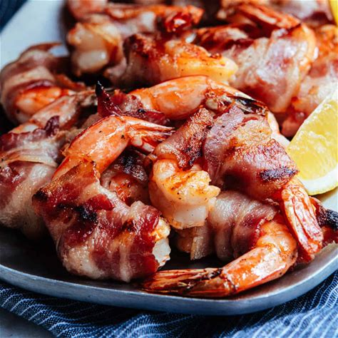 grilled-bacon-wrapped-shrimp-pinch-and-swirl image