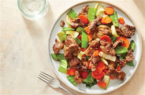 spicy-beef-stir-fry-with-snow-peas-carrots-bok-choy image