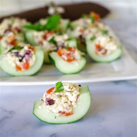 greek-salad-stuffed-cucumber-bites-divalicious image