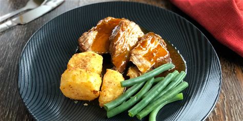 slow-cooker-roast-pork-with-honey-garlic-butter-gravy image
