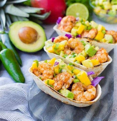 shrimp-tacos-with-avocado-mango-and-pineapple-salsa image