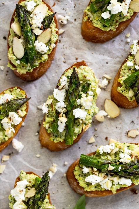 citrus-pesto-crostini-with-goat-cheese-fork-in-the image