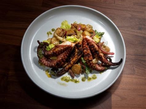 grilled-octopus-with-a-warm-potato-salad-smoked image