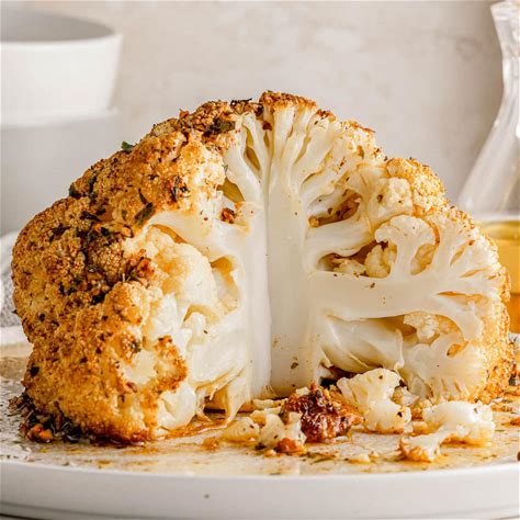 whole-roasted-cauliflower-recipe-mom-on-timeout image
