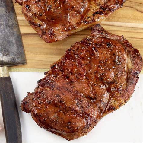grilled-ribeye-steaks-with-brown-sugar-rub-out image