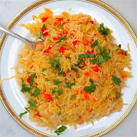 easy-vegetable-rice-pilaf-yellow-turmeric-rice-vegan image
