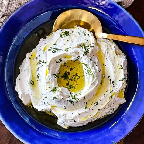 easy-labneh-dip-recipe-with-garlic-and-dill-sip-bite-go image