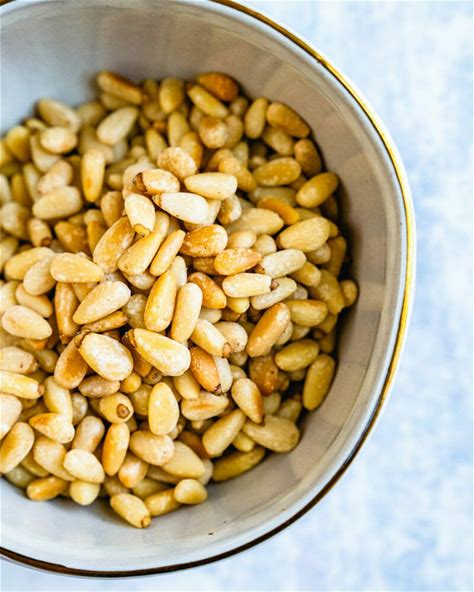 how-to-toast-pine-nuts-2-ways-a-couple-cooks image